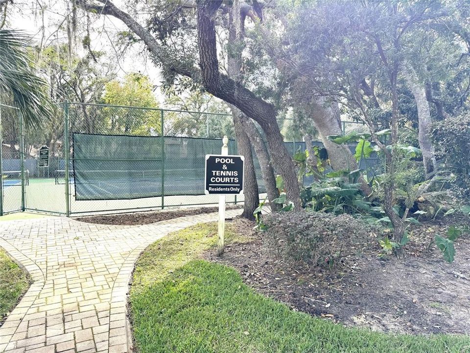 Entryway of the community tennis court and pool