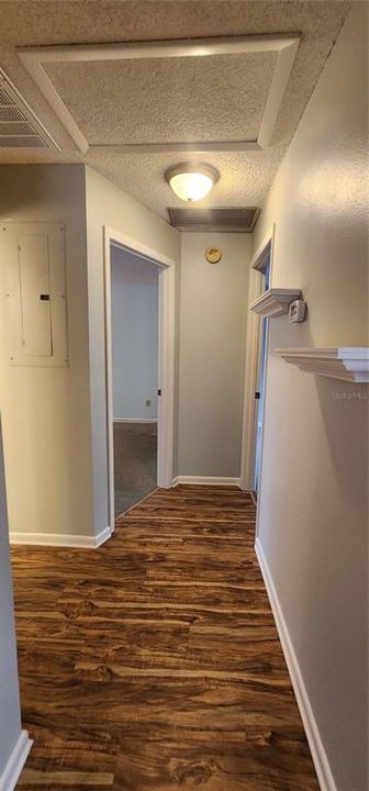 Hallway looking towards living area from bedrooms