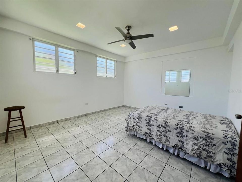 Bedroom, windows facing southeast.