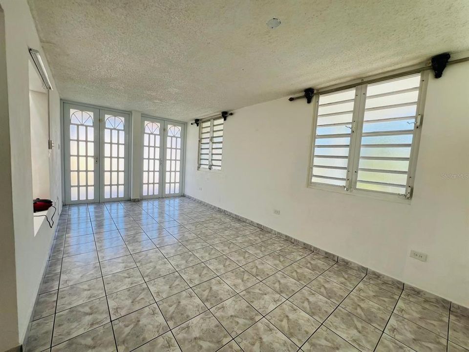 Living room and doors to balcony