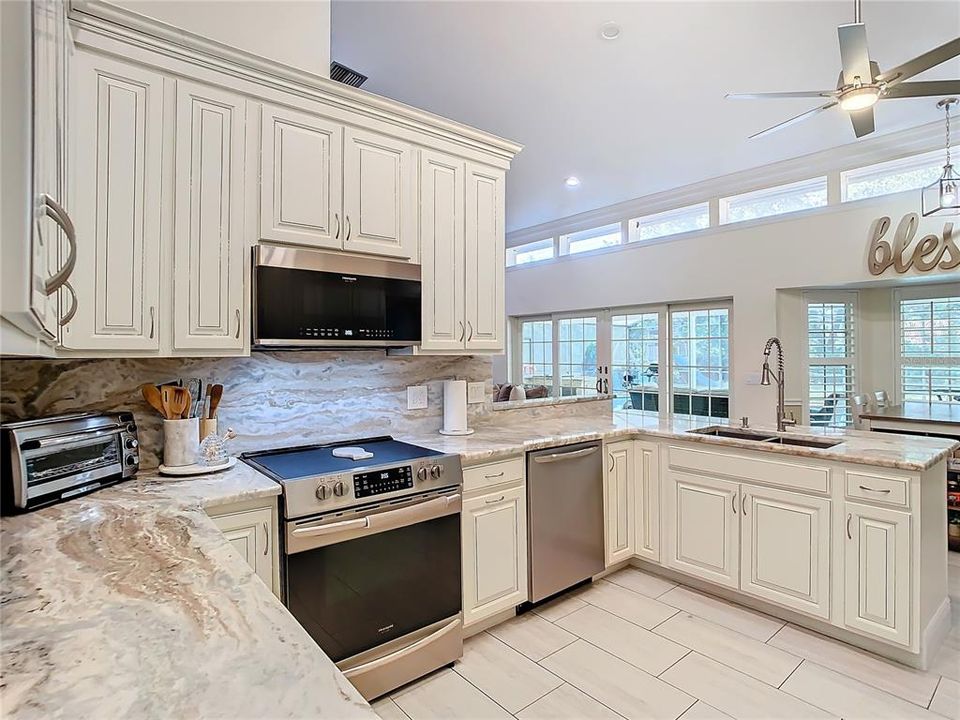 Custom real wood 42 in cabinets with custom trim molding