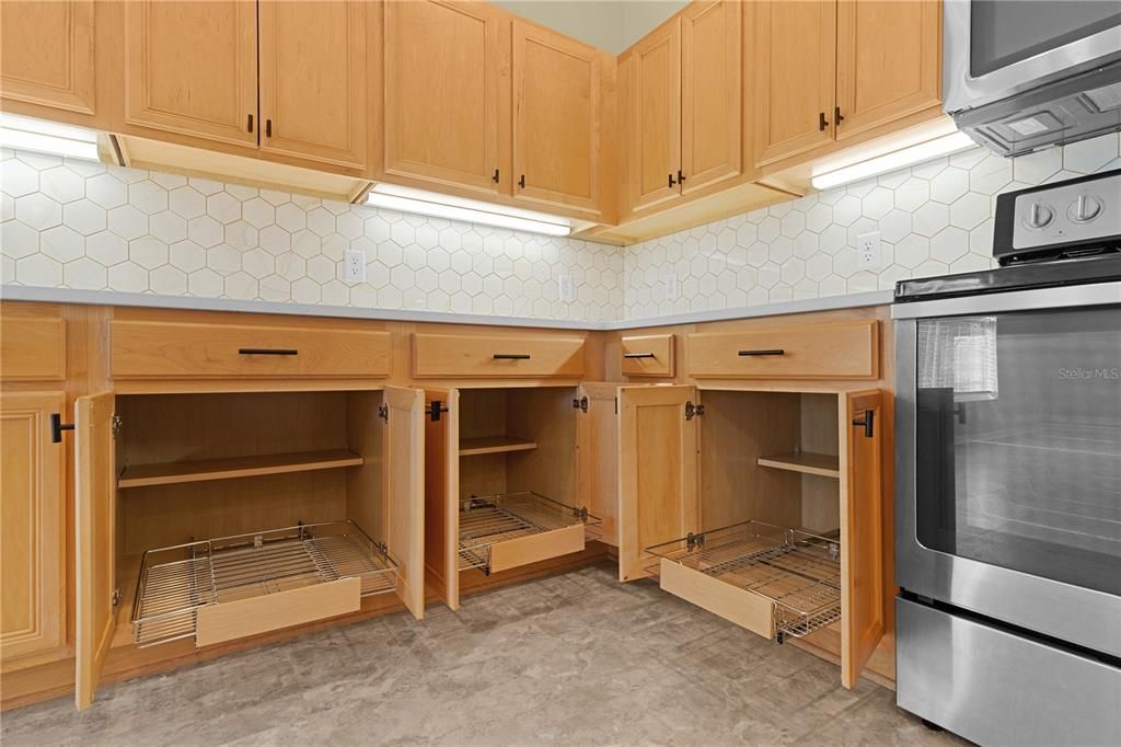 Kitchen showing pull-out drawers