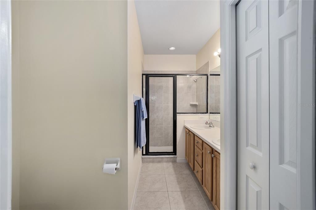 Owner's Bath - Step-in shower with linen closet