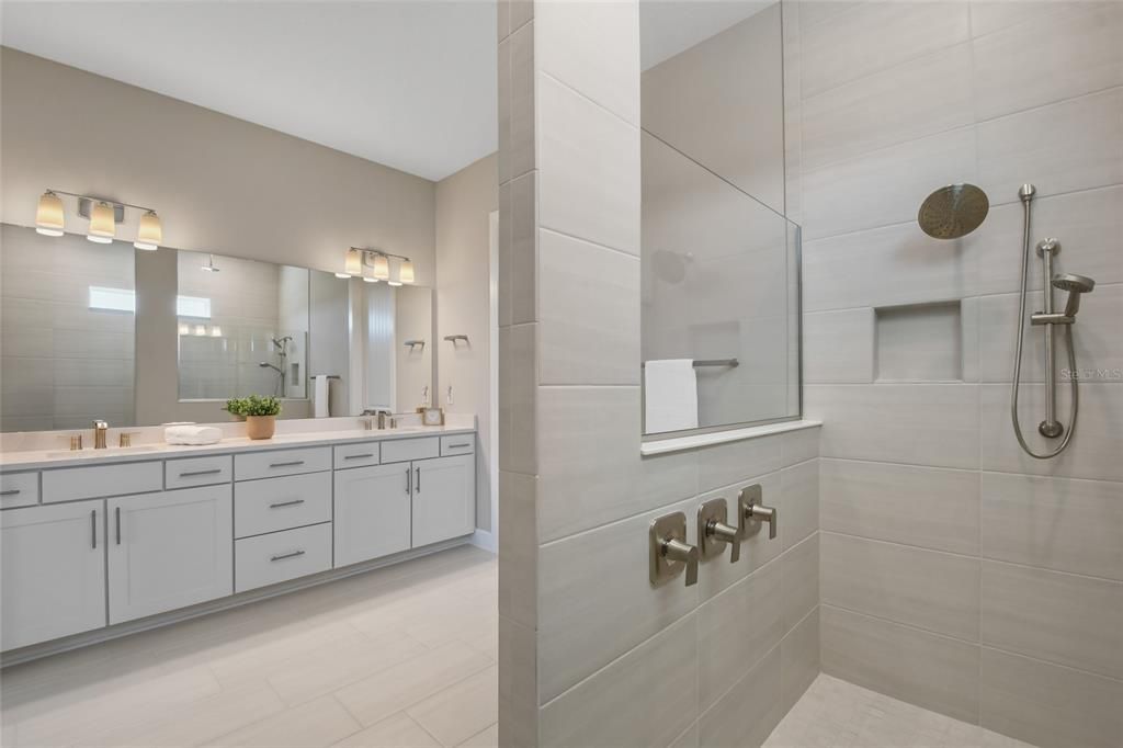 Floor to Ceiling Tile and Multiple Shower Heads