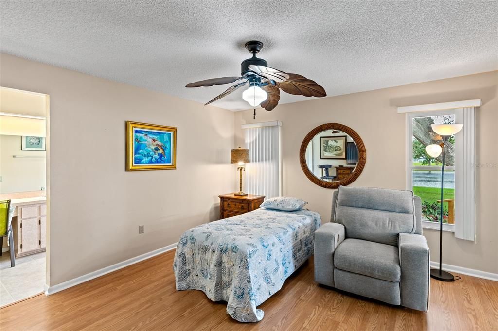 Primary Bedroom slider doors to the Florida Room