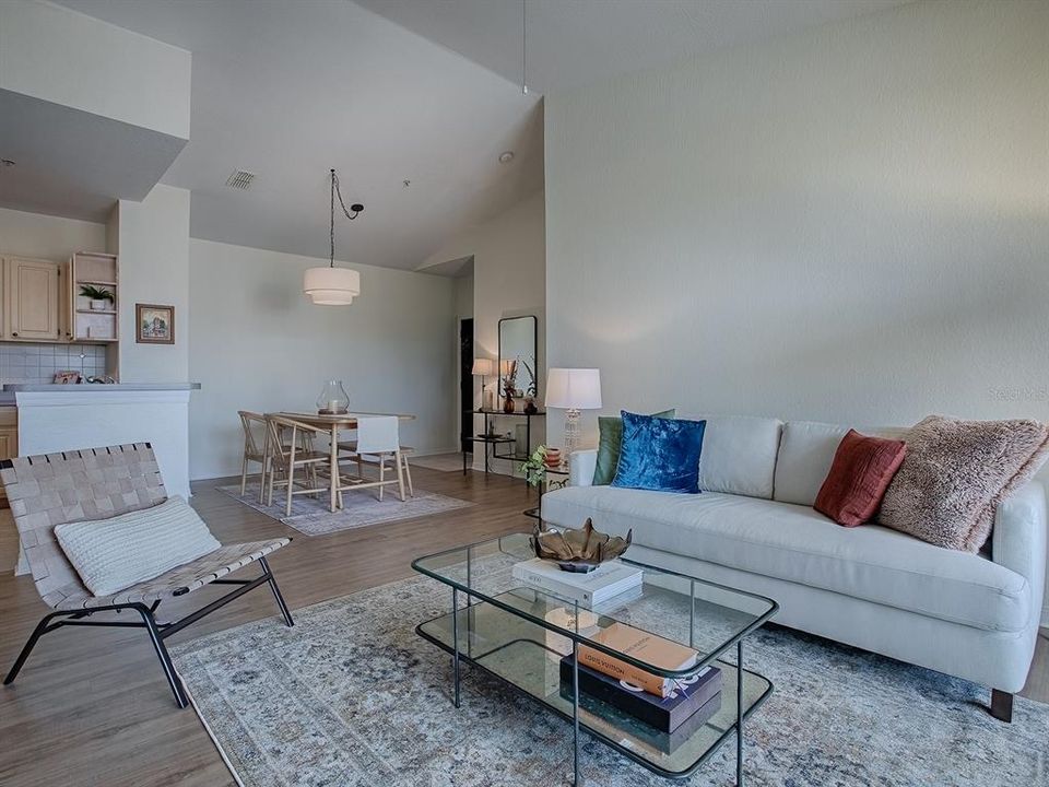 Living Room open to Dining and Kitchen