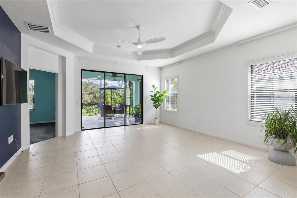 Living/great room. Mounted TV conveys.