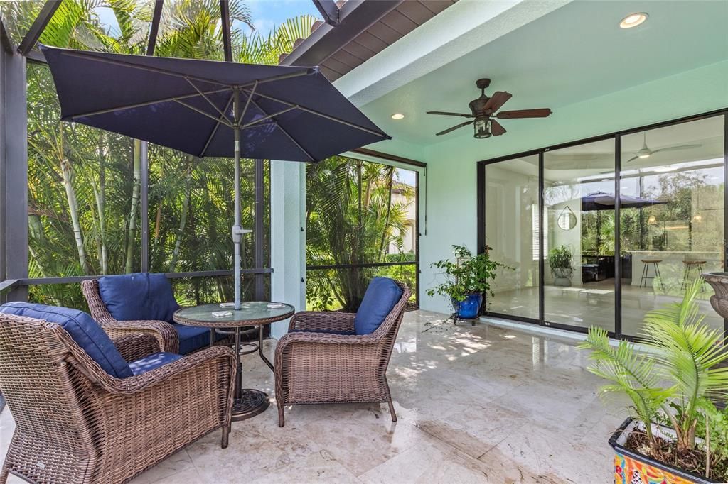 Peaceful lanai with shade screen