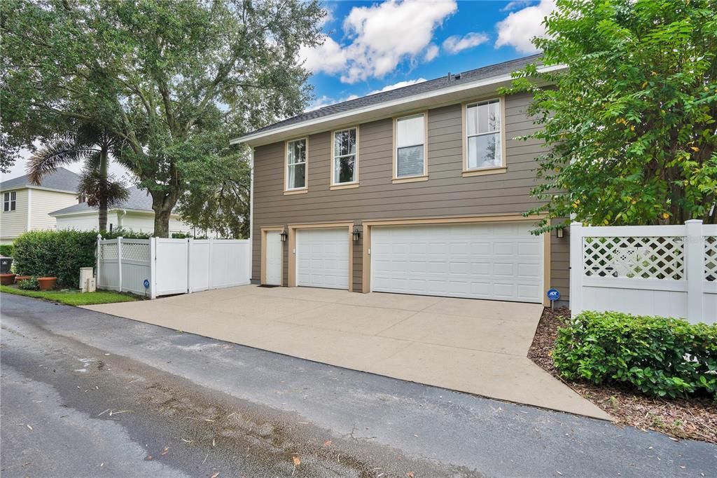 3 Door Garage and Entrance to Garage Apartment