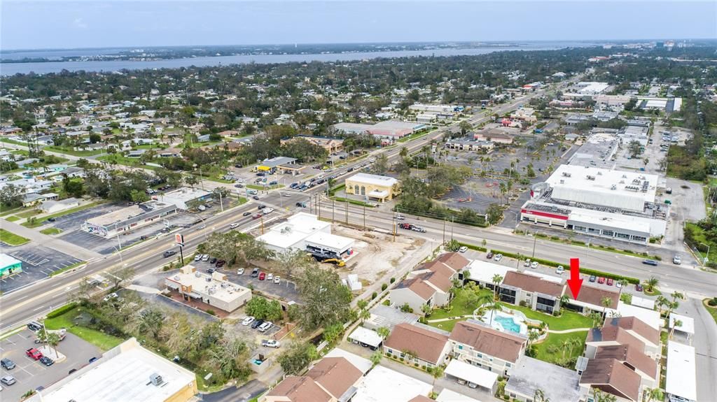 Aerial view of Pebble Springs Cluster V - Gulf beaches in the backgrond.