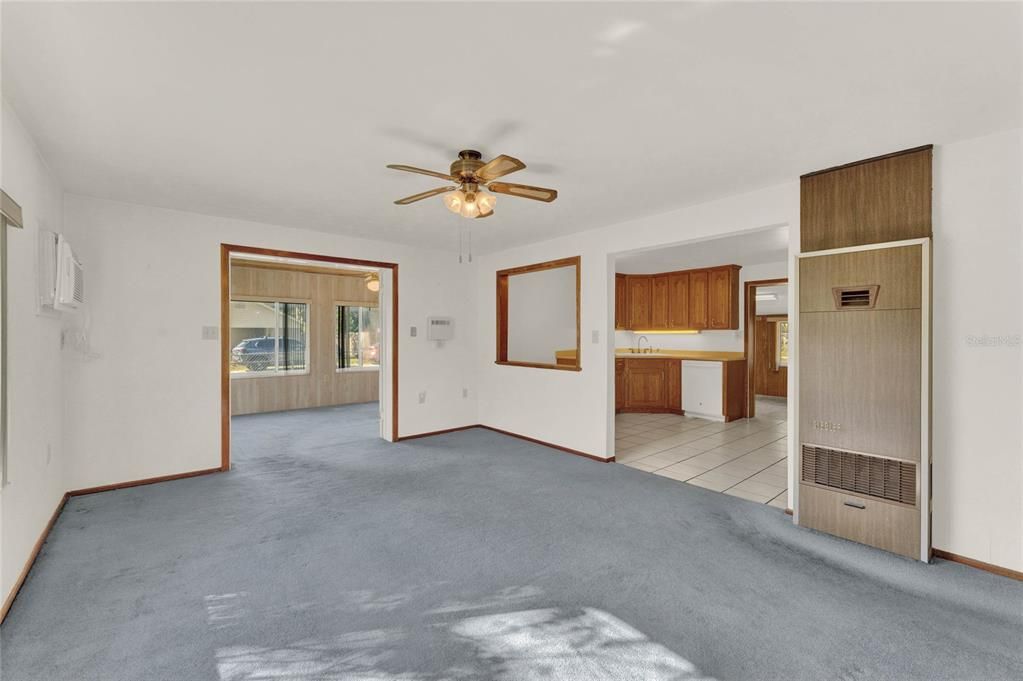 Living Room to Foyer and Kitchen