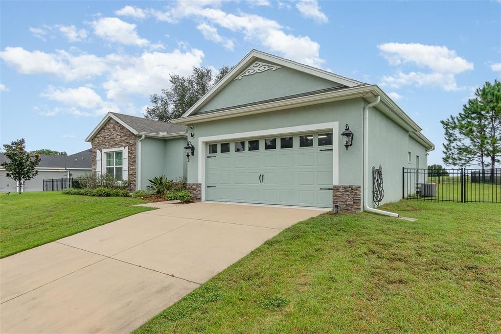 Garage and driveway at 24242 Calusa Blvd