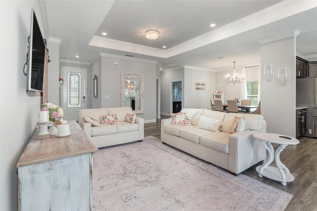 Family room looking back toward the foyer and entrance to the home