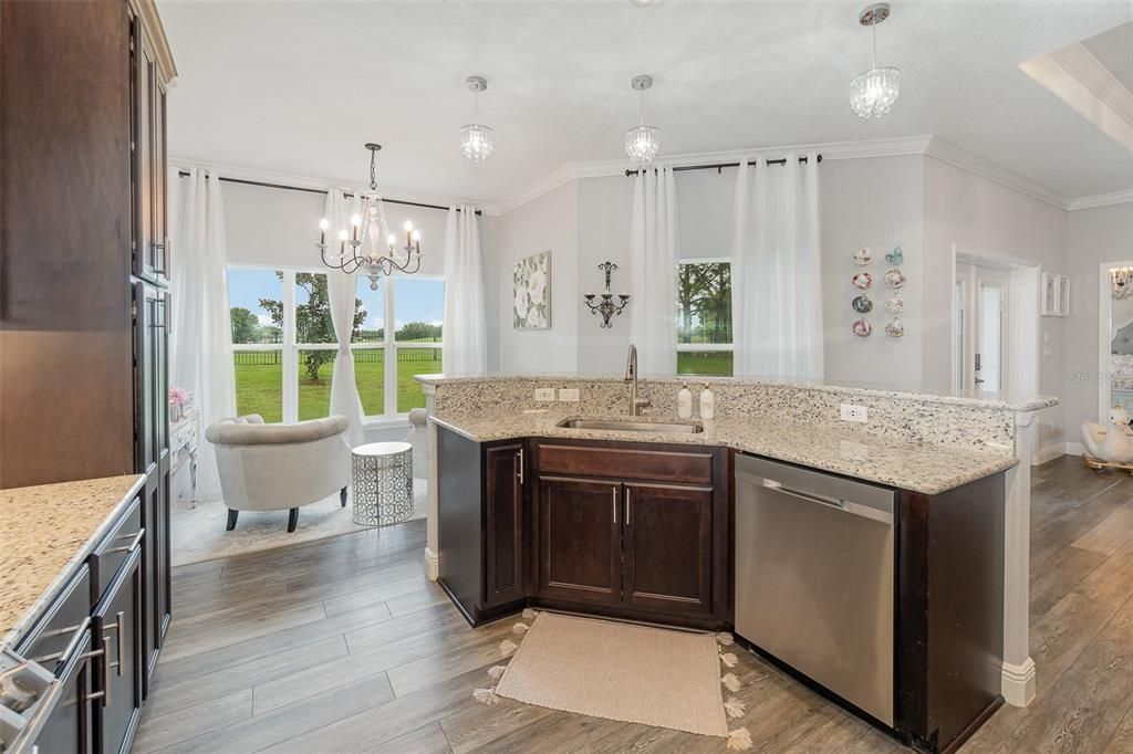 Kitchen looking out to the Breakfast Nook and Golf Course in the distance