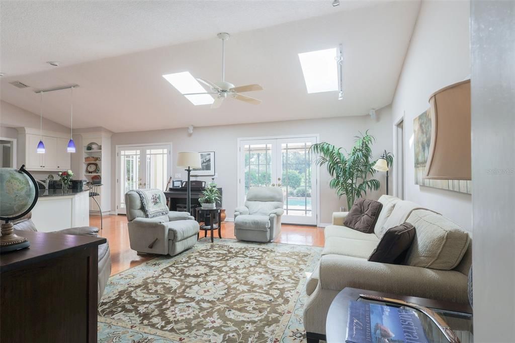 Bright Family Room with views to backyard and pond