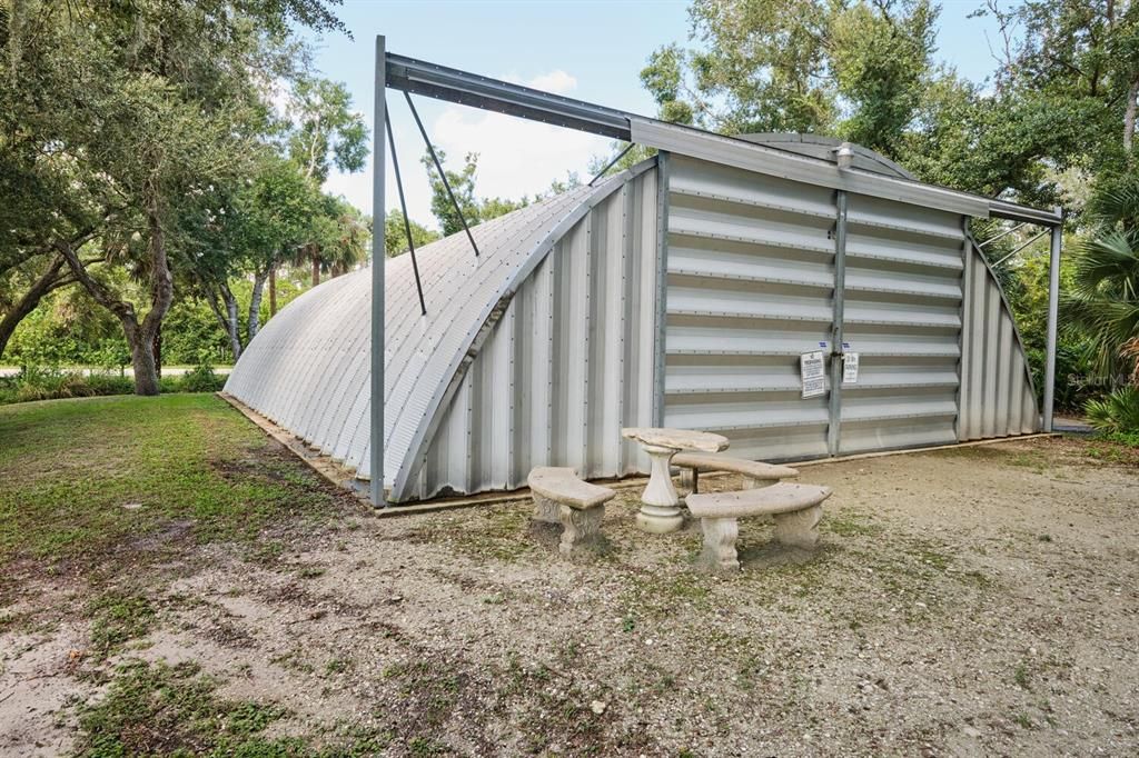 Quonset hut with commercial lift and plumbed air compressor