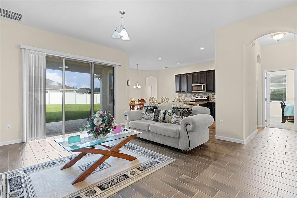 View of Family Room w/3 panel slider to backyard