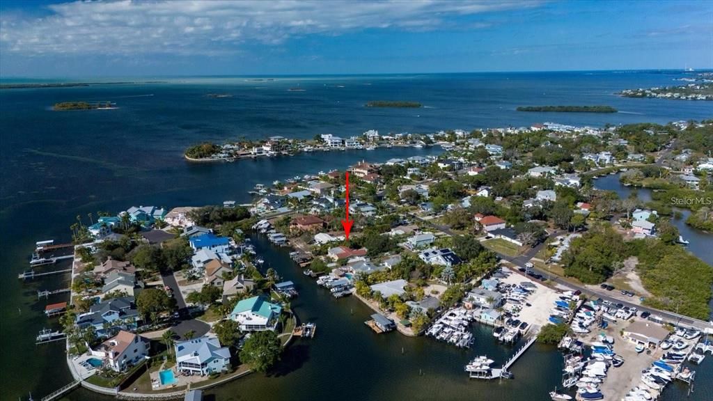 Aerial view - red arrow points to the house. ***Please note this shot was taken before Helene***