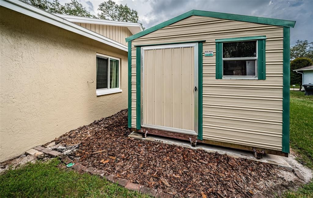 Twin aluminum sided shed.  10x12 on cement pad