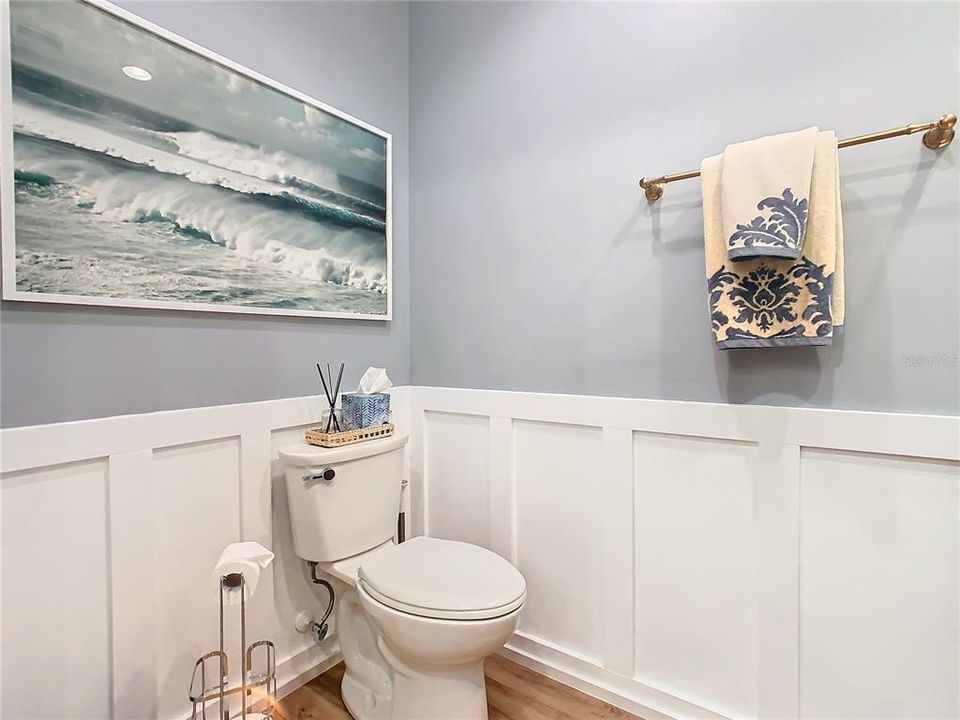 First Floor Half Bathroom with wainscoting