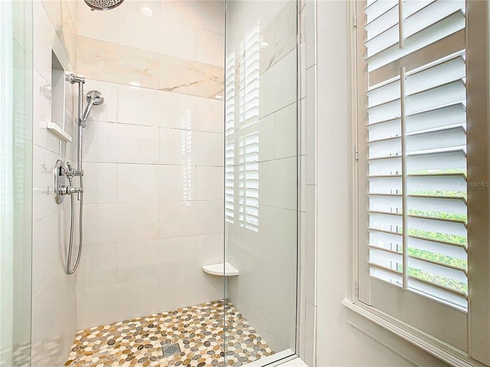 Walk-in Shower with Frameless Glass Enclosure