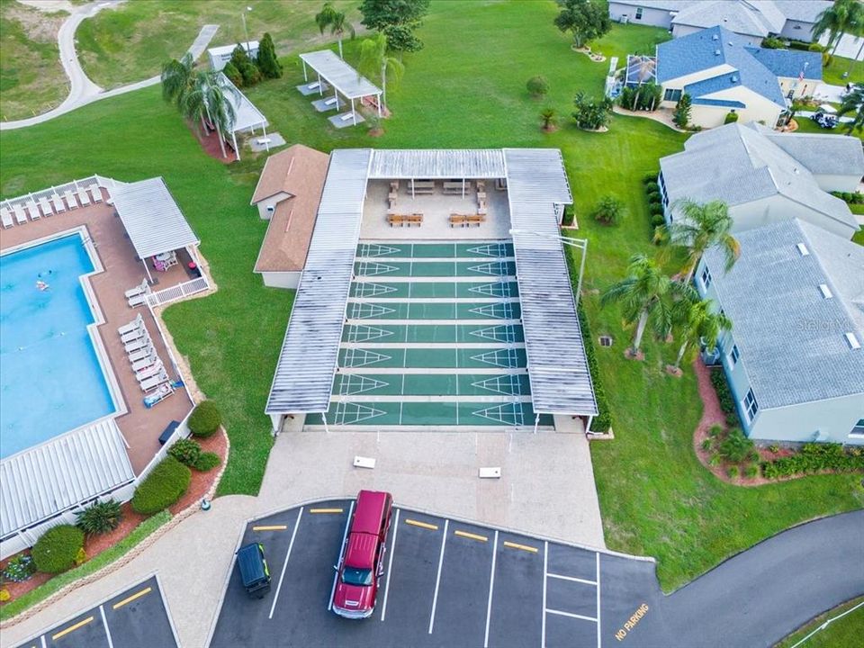 Shuffleboard, BBQ Grills, Cornhole, with a bit of the Office on the right.