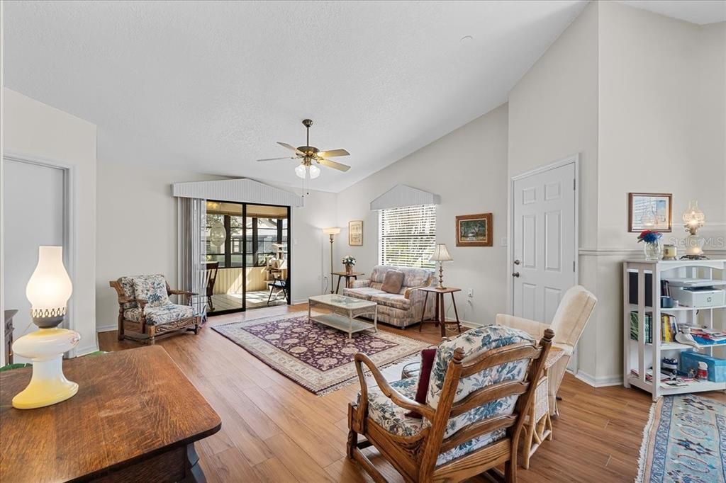 Light-filled Living Room, flowing to the cheerful air-conditioned Sun Room/Lanai