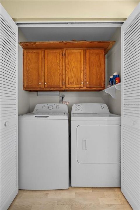 Indoor laundry discreetly hidden in a clever kitchen closet, and you'll have a brand new washer too!