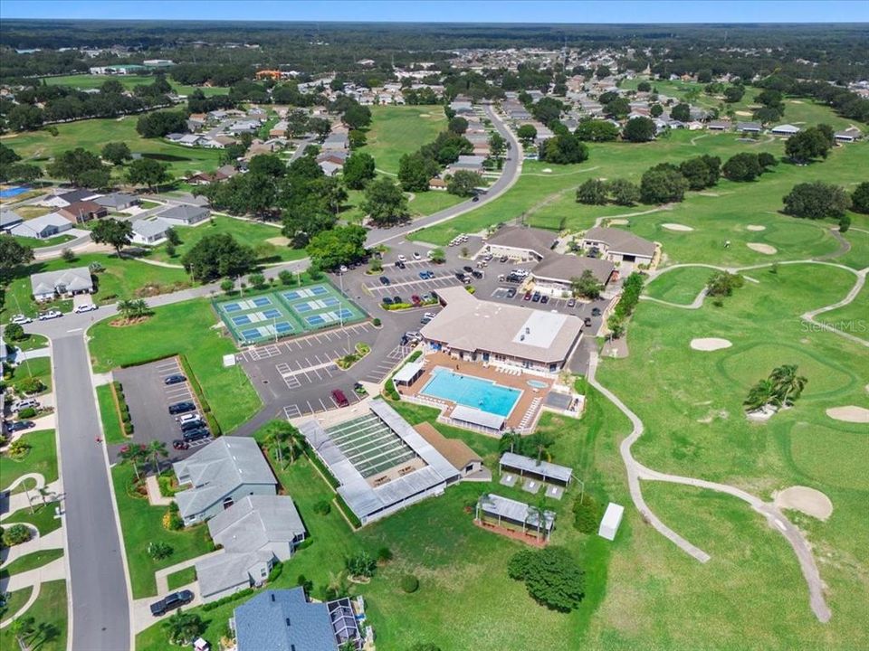 West side amenities - Clubhouse, Pool, Hot Tub, Sauna, Billiards, Card Clubs, Travel Club, Bowling Club, Singles Club, Golf Facilities and Offices, Restaurant, Pickleball Courts, Shuffleboard, Cornhole, BBQ Grills, POA Office where Newspiper, Library, and Social Committee are. East side has Tennis Courts, Pool, Hot Tub, Recreation Center.