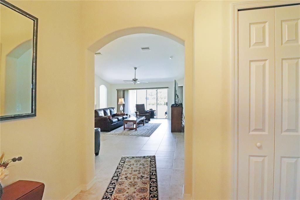 Large foyer with a coat closet