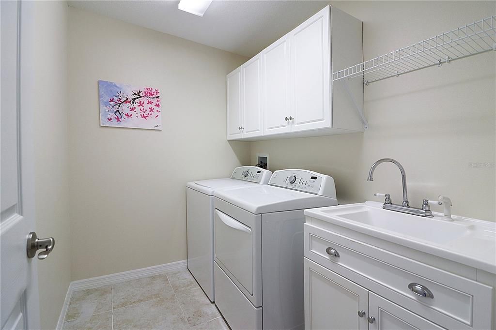 Inside laundry/mud room with extra cabinets