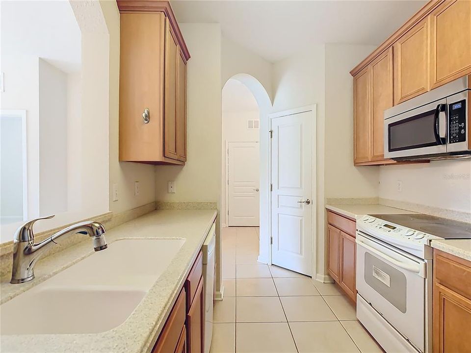 The kitchen is conveniently located near the front of the unit.