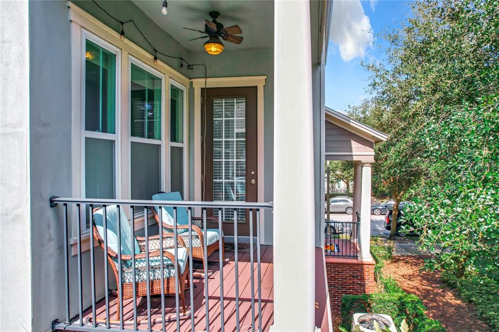 This porch is a perfect setting for coffee or wine.