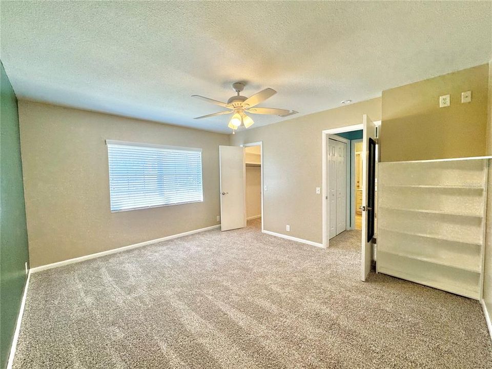 2nd Bedroom - built in shelving and walk-in closet