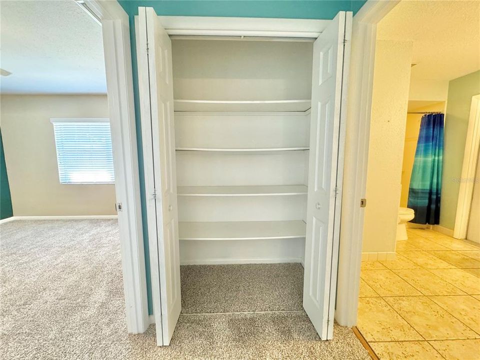 Linen closet off hall bath and 2nd bedroom