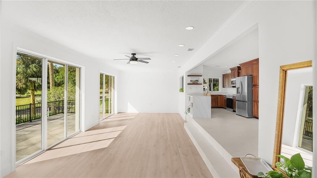 Gorgeous open floorpan with tons of natural light! Featuring luxury laminate flooring from Spain.