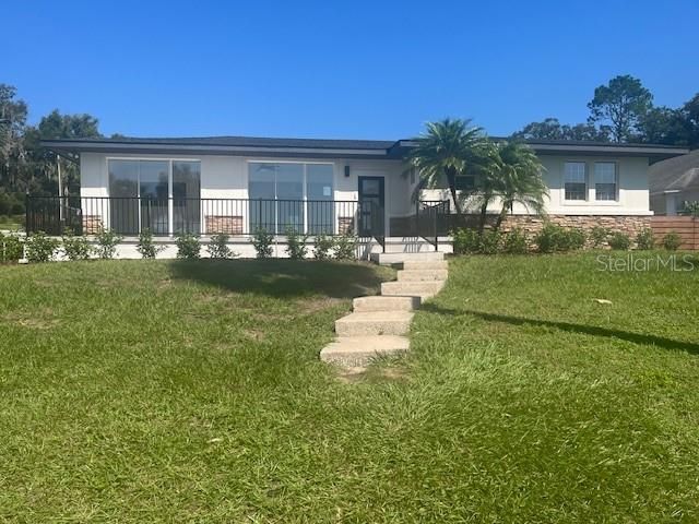 Lakefront Luxury Living in Historic Eustis – Renovated Home with Stunning View