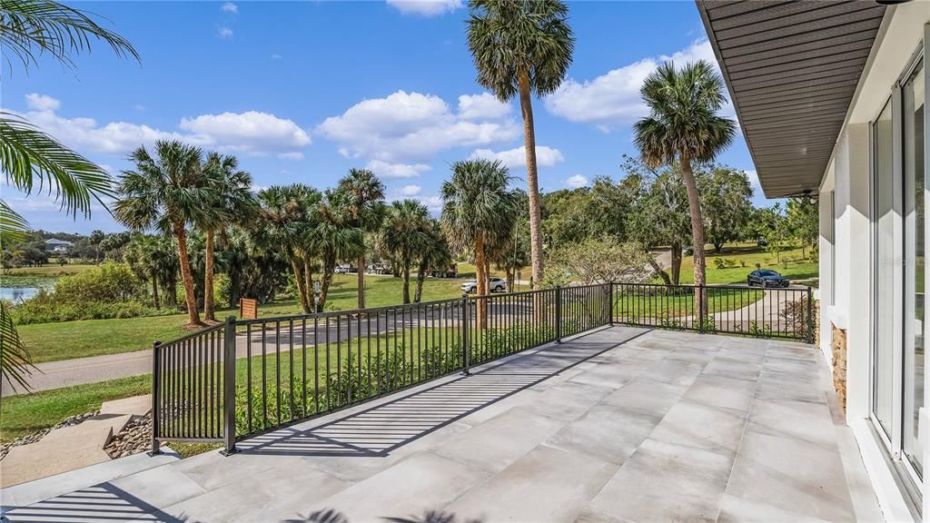 WOW look at this view on the front patio with new flooring and fencing.