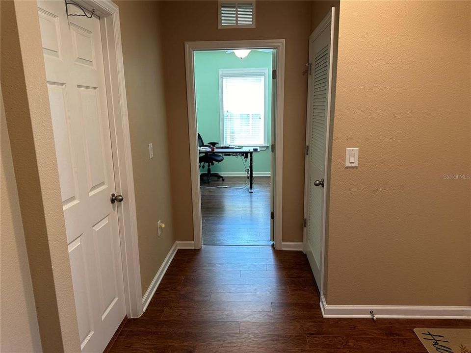 Laundry on left, Guest Bedroom 3. Garage on right