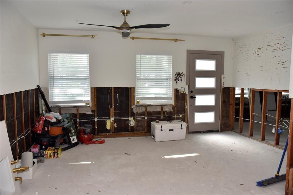 Living room toward the front door. Current condition after mitigation of floodwater was done within 48 hours of the storm. 10/16