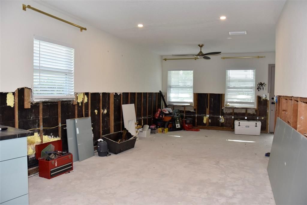 Great room or dining/living room combination toward the front door. Current condition after mitigation of floodwater was done within 48 hours of the storm. 10/16