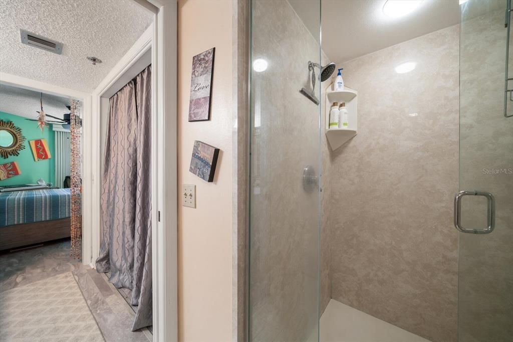 Ensuite primary bathroom with walk in shower