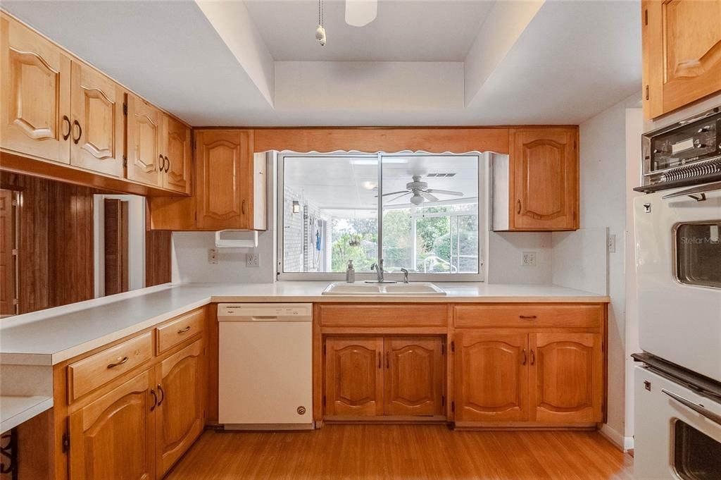 Kitchen w/ pass-thru window to Lanai