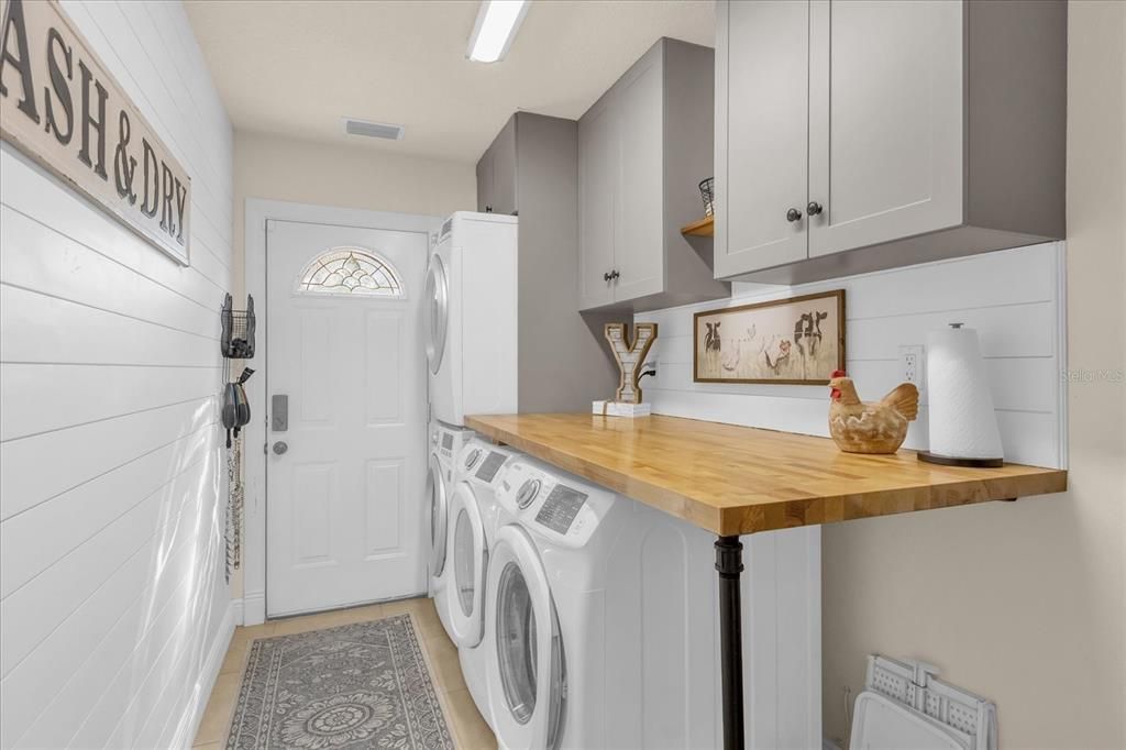 Laundry room lower level with (2) washers and (2 ) dryers