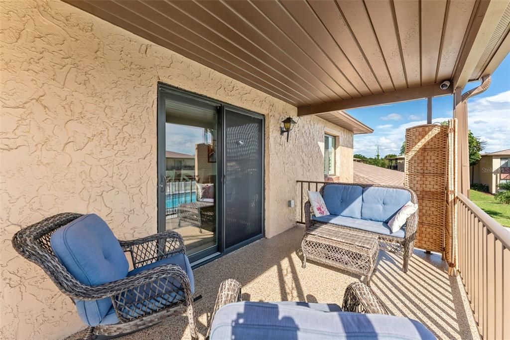 The back patio facing south features epoxy flooring.