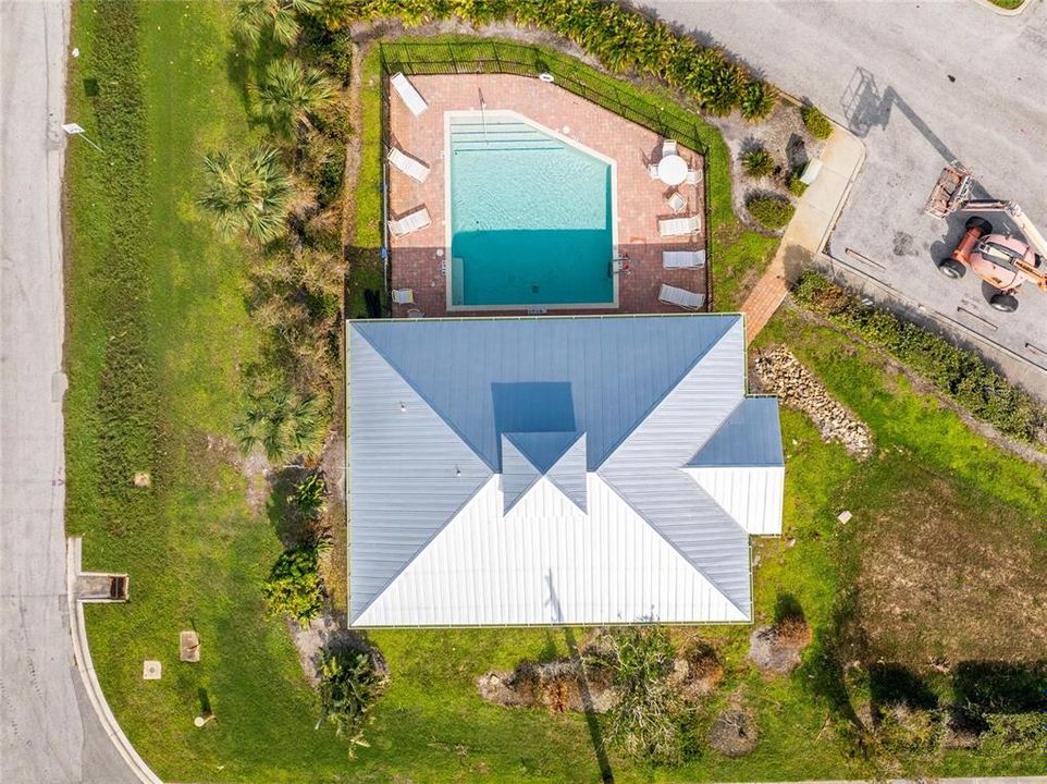 Aerial view showing the community pool and clubhouse.