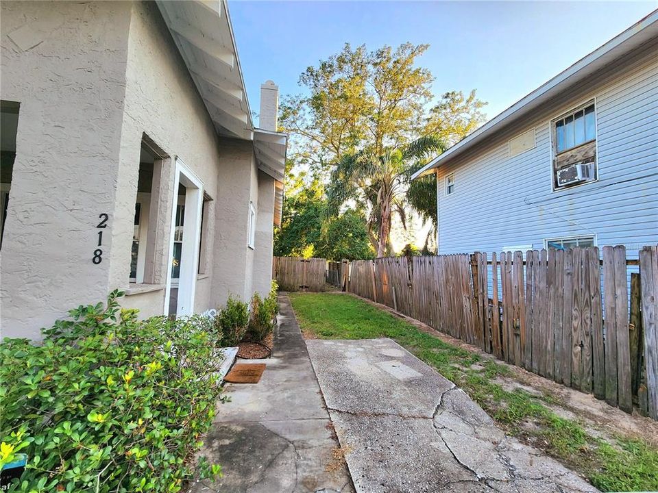 Side of house with paved drive way