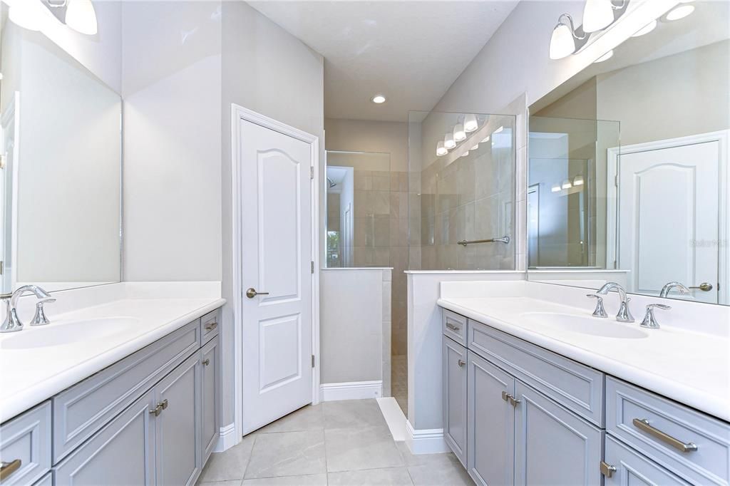 Dual vanities and spacious walk in shower!