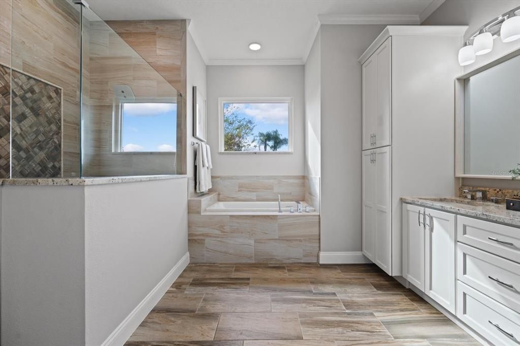 Master bathroom with beautiful soaking tub and walk in shower