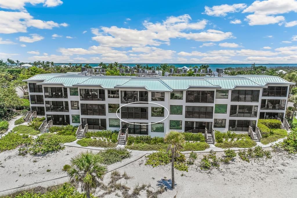 Beach Chalet 204 is a second-floor condo located in the center of the building, offering unobstructed views of the Gulf without any neighboring windows in sight.